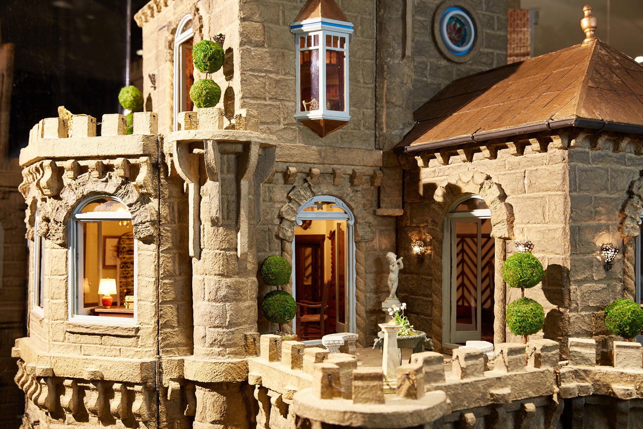 Dollhouse castle The dollhouse derives its name from the castle featured in "The Lady of Shallot," a 19th-century ballad penned by Alfred Lord Tennyson.